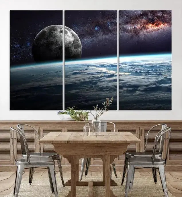 The Space and Planet Canvas Print, a triptych showcasing Earth and the Moon from space on museum-quality canvas with UV-protective coating, hangs prominently in the room.