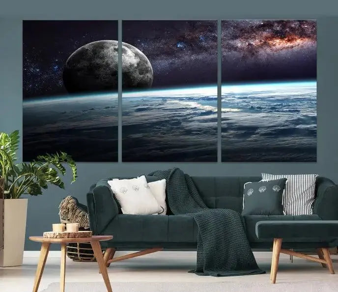 The Space and Planet Canvas Print, a triptych showcasing Earth and the Moon from space on museum-quality canvas with UV-protective coating, hangs prominently in the room.