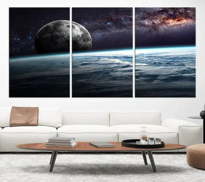 The Space and Planet Canvas Print, a triptych showcasing Earth and the Moon from space on museum-quality canvas with UV-protective coating, hangs prominently in the room.