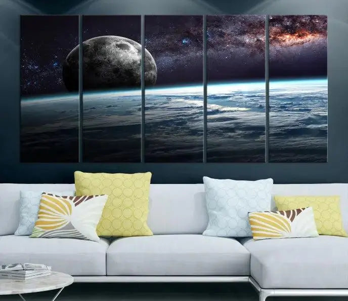 The Space and Planet Canvas Print, a triptych showcasing Earth and the Moon from space on museum-quality canvas with UV-protective coating, hangs prominently in the room.