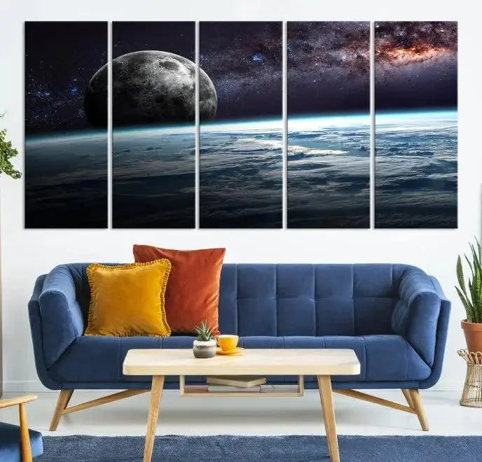 The Space and Planet Canvas Print, a triptych showcasing Earth and the Moon from space on museum-quality canvas with UV-protective coating, hangs prominently in the room.