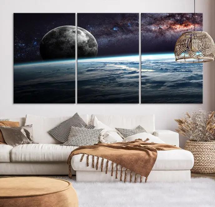 The Space and Planet Canvas Print, a triptych showcasing Earth and the Moon from space on museum-quality canvas with UV-protective coating, hangs prominently in the room.