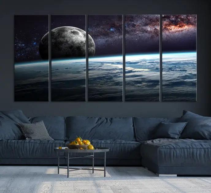 The Space and Planet Canvas Print, a triptych showcasing Earth and the Moon from space on museum-quality canvas with UV-protective coating, hangs prominently in the room.