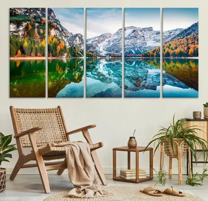 The "Spectacular Autumn View of Braies Lake Wall Art Canvas Print" showcases a serene mountain lake framed by colorful autumn trees reflected in the water. This museum-quality artwork is adorned with a UV-protective coating to maintain its vivid colors and elegantly gallery wrapped to enhance its contemporary appeal.