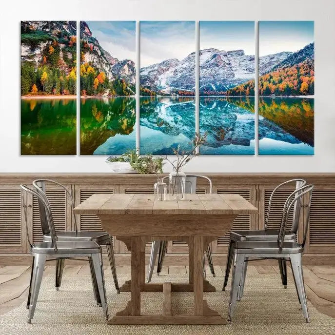 The "Spectacular Autumn View of Braies Lake Wall Art Canvas Print" showcases a serene mountain lake framed by colorful autumn trees reflected in the water. This museum-quality artwork is adorned with a UV-protective coating to maintain its vivid colors and elegantly gallery wrapped to enhance its contemporary appeal.