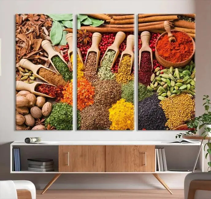 The "Spices Kitchen Wall Art Canvas Print" showcases an array of colorful spices in wooden scoops, crafted on museum-quality canvas.