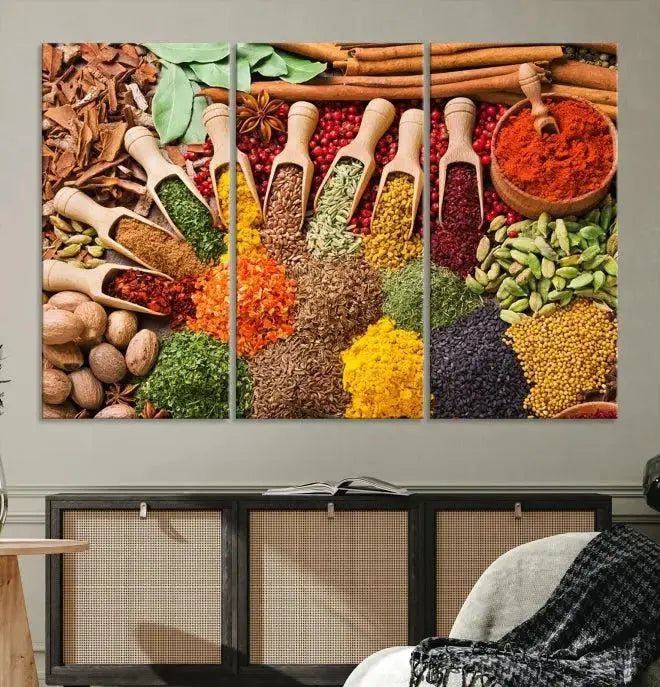 The "Spices Kitchen Wall Art Canvas Print" showcases an array of colorful spices in wooden scoops, crafted on museum-quality canvas.