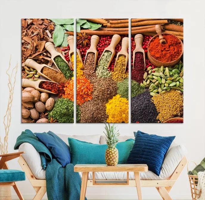 The "Spices Kitchen Wall Art Canvas Print" showcases an array of colorful spices in wooden scoops, crafted on museum-quality canvas.