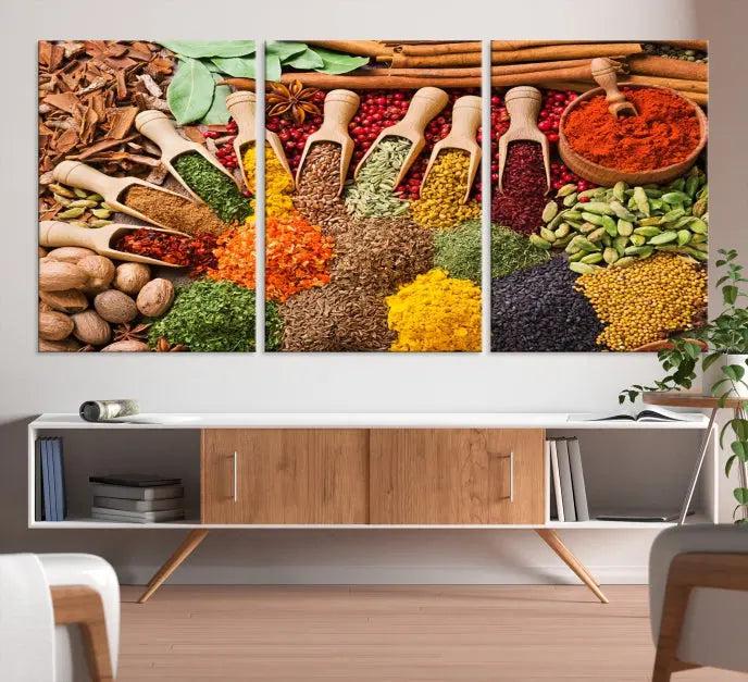 The "Spices Kitchen Wall Art Canvas Print" showcases an array of colorful spices in wooden scoops, crafted on museum-quality canvas.