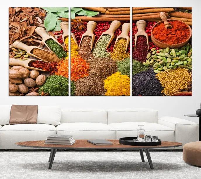 The "Spices Kitchen Wall Art Canvas Print" showcases an array of colorful spices in wooden scoops, crafted on museum-quality canvas.