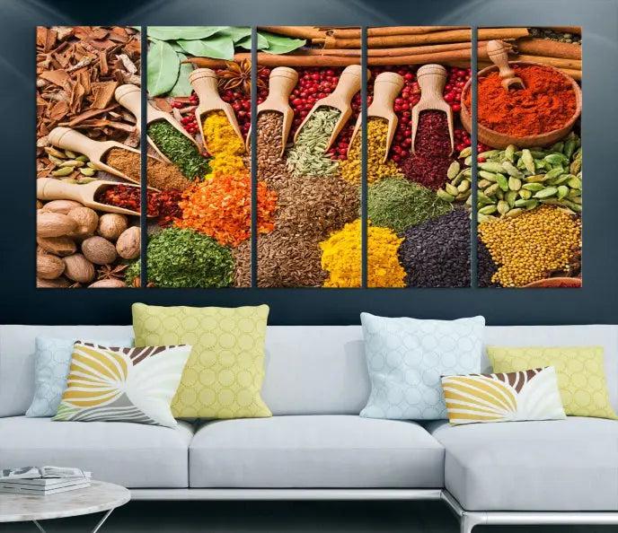 The "Spices Kitchen Wall Art Canvas Print" showcases an array of colorful spices in wooden scoops, crafted on museum-quality canvas.