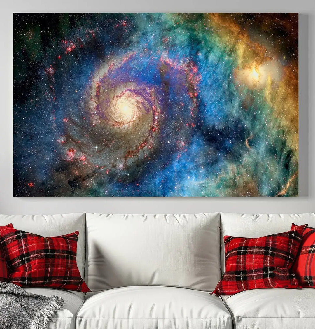 The living room showcases three colorful space-themed paintings titled "Spiral Galaxy Wall Art Canvas Print" on the wall, featuring museum-quality craftsmanship with vibrant colors through high-resolution printing.