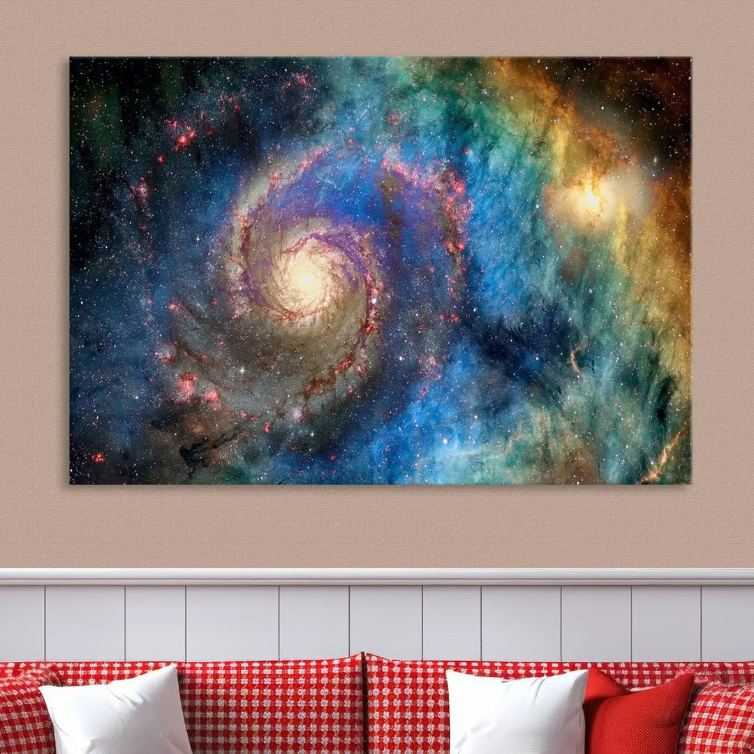 The living room showcases three colorful space-themed paintings titled "Spiral Galaxy Wall Art Canvas Print" on the wall, featuring museum-quality craftsmanship with vibrant colors through high-resolution printing.