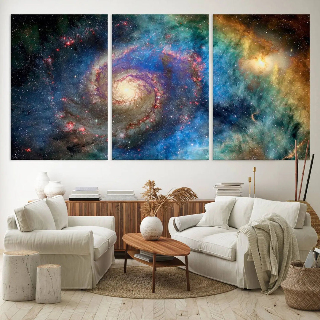 The living room showcases three colorful space-themed paintings titled "Spiral Galaxy Wall Art Canvas Print" on the wall, featuring museum-quality craftsmanship with vibrant colors through high-resolution printing.