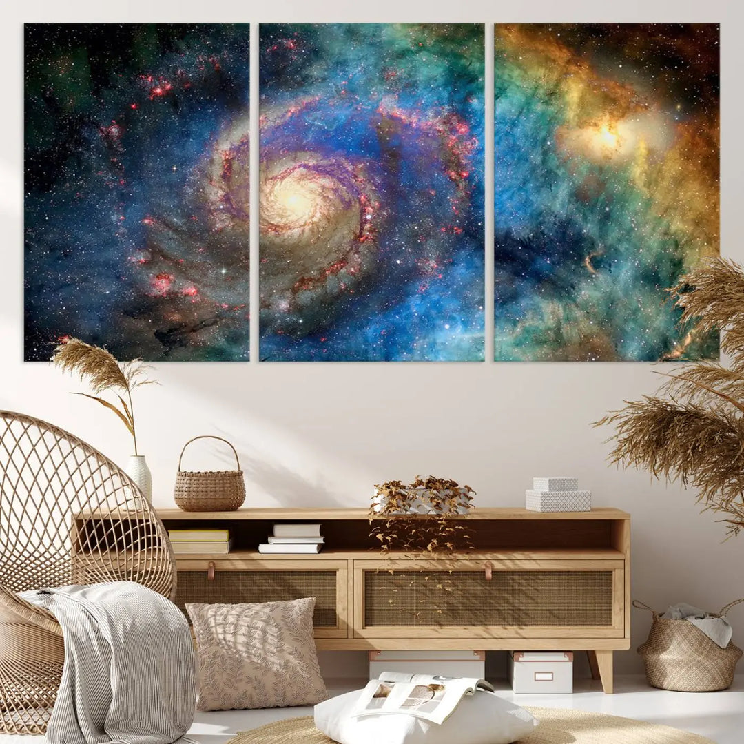 The living room showcases three colorful space-themed paintings titled "Spiral Galaxy Wall Art Canvas Print" on the wall, featuring museum-quality craftsmanship with vibrant colors through high-resolution printing.