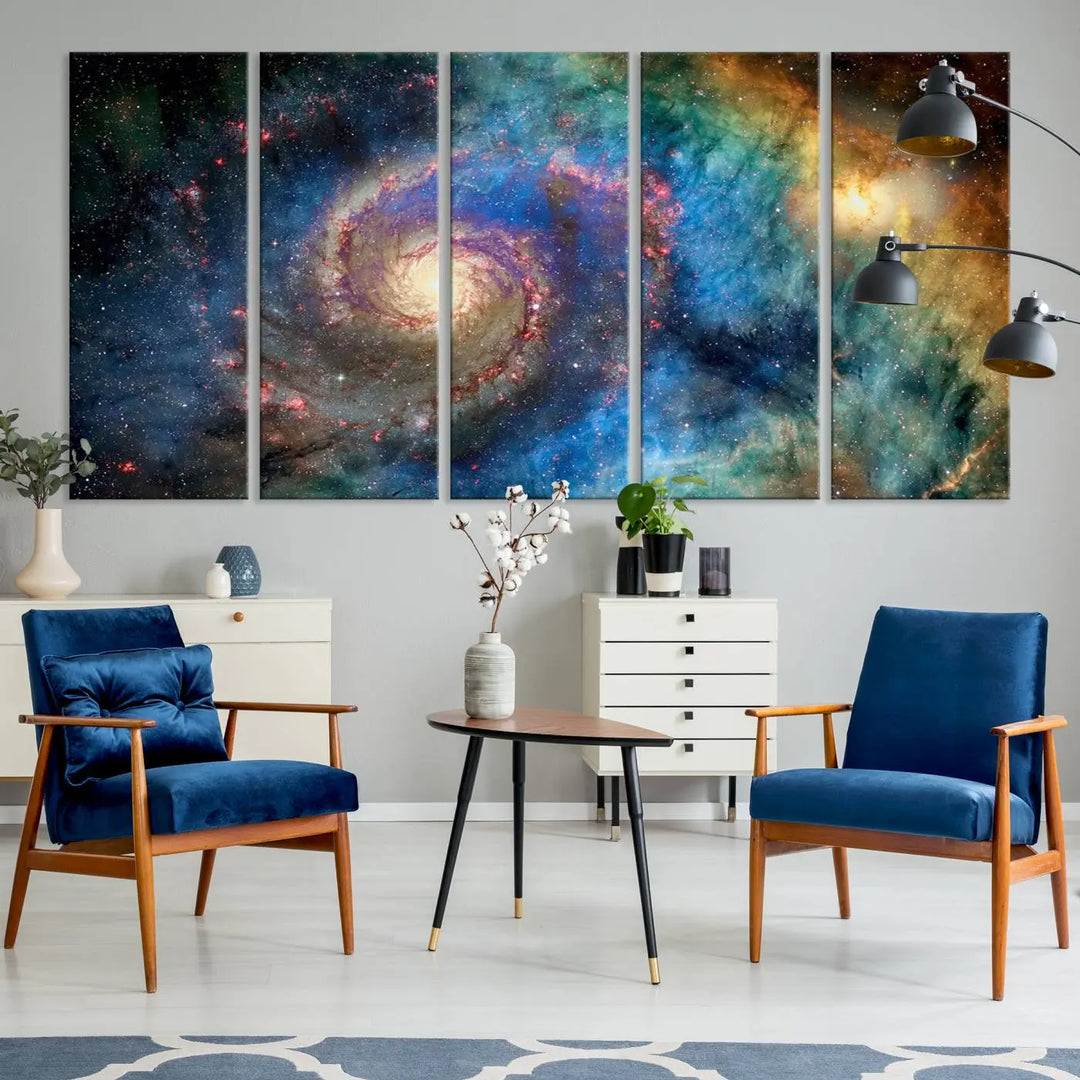 The living room showcases three colorful space-themed paintings titled "Spiral Galaxy Wall Art Canvas Print" on the wall, featuring museum-quality craftsmanship with vibrant colors through high-resolution printing.