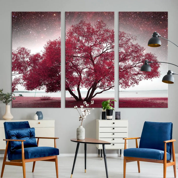 A living room adorned with a museum-quality triptych artwork on gallery-wrapped canvas titled "Spring Night Infrared Red Leaves and Tree," which showcases a pink tree against a starry sky.