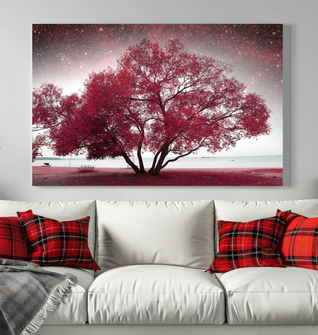 A living room adorned with a museum-quality triptych artwork on gallery-wrapped canvas titled "Spring Night Infrared Red Leaves and Tree," which showcases a pink tree against a starry sky.