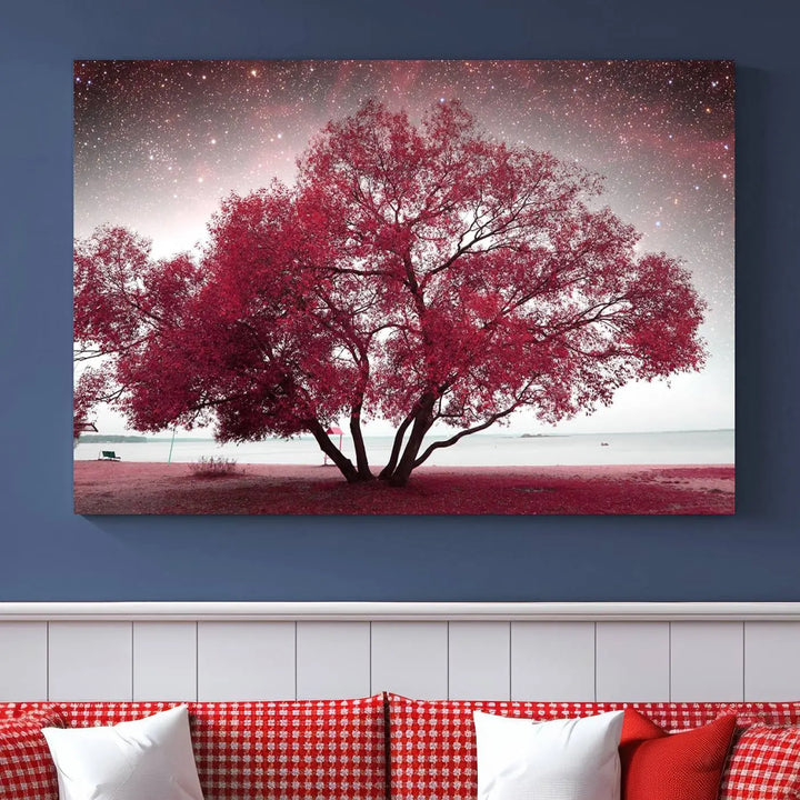 A living room adorned with a museum-quality triptych artwork on gallery-wrapped canvas titled "Spring Night Infrared Red Leaves and Tree," which showcases a pink tree against a starry sky.