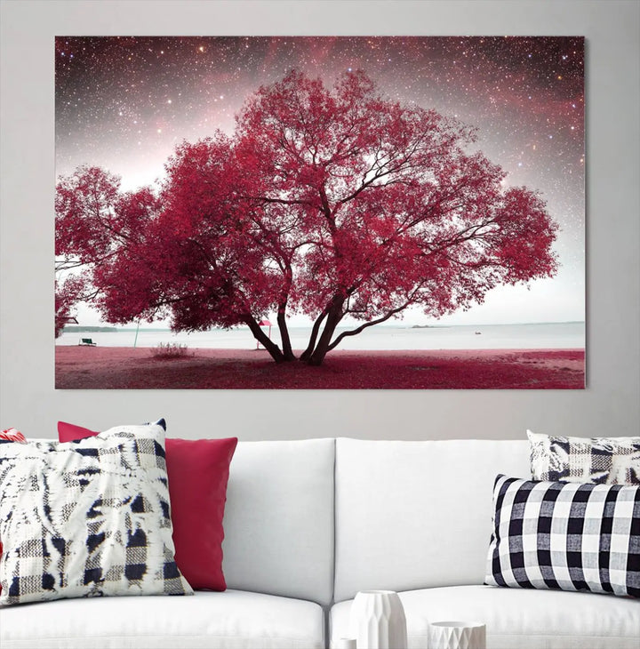 A living room adorned with a museum-quality triptych artwork on gallery-wrapped canvas titled "Spring Night Infrared Red Leaves and Tree," which showcases a pink tree against a starry sky.