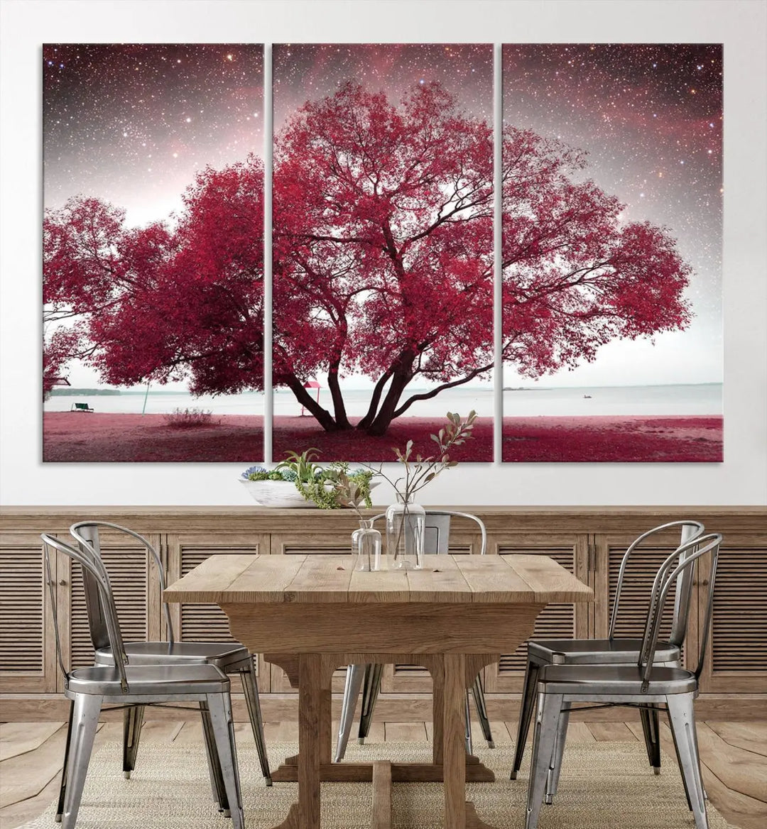 A living room adorned with a museum-quality triptych artwork on gallery-wrapped canvas titled "Spring Night Infrared Red Leaves and Tree," which showcases a pink tree against a starry sky.