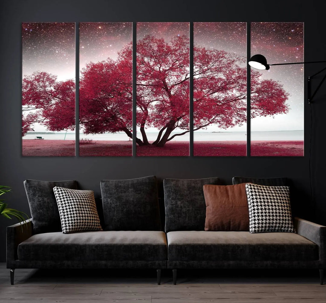 A living room adorned with a museum-quality triptych artwork on gallery-wrapped canvas titled "Spring Night Infrared Red Leaves and Tree," which showcases a pink tree against a starry sky.