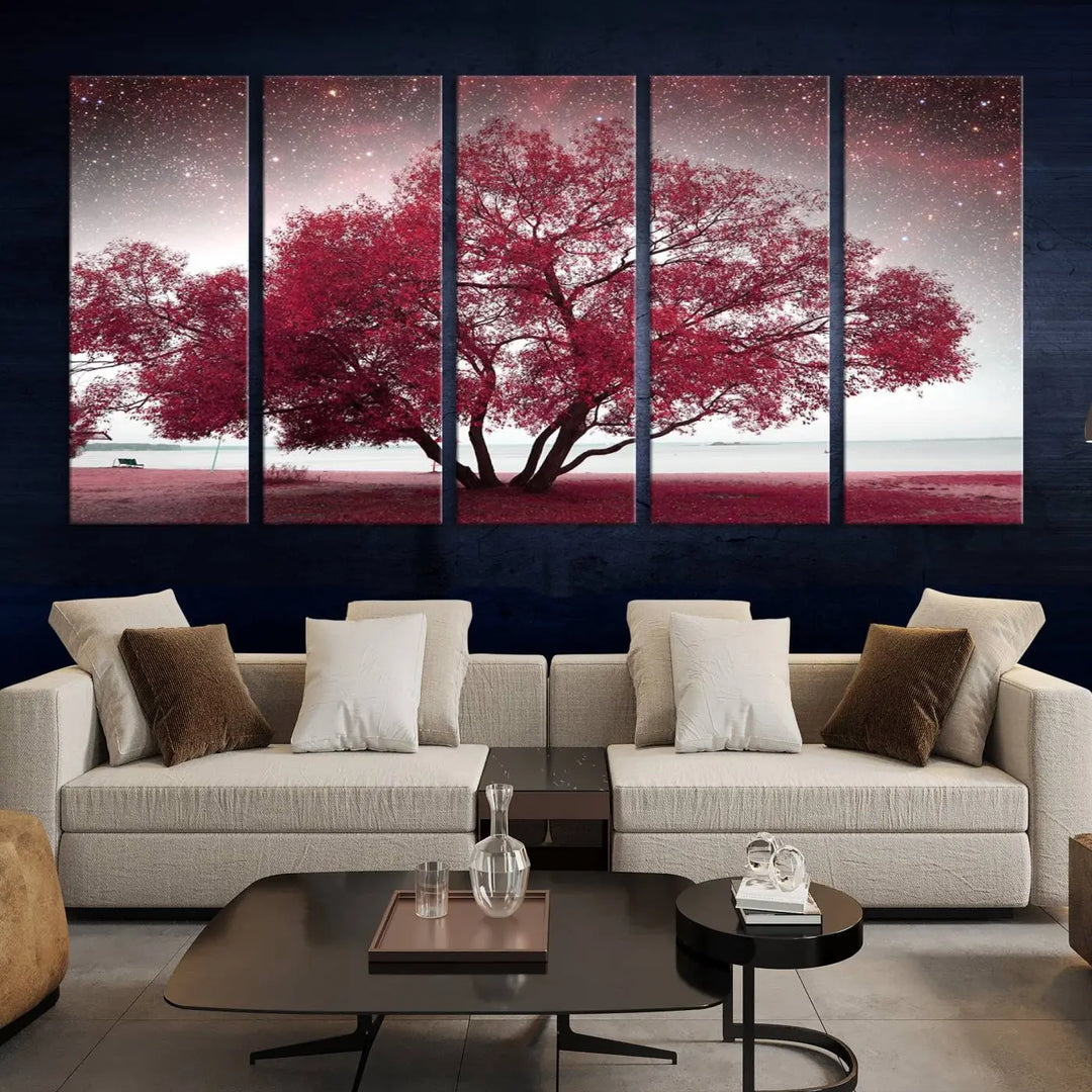 A living room adorned with a museum-quality triptych artwork on gallery-wrapped canvas titled "Spring Night Infrared Red Leaves and Tree," which showcases a pink tree against a starry sky.