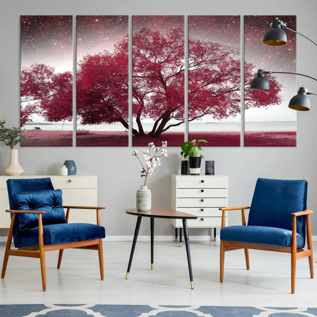 A living room adorned with a museum-quality triptych artwork on gallery-wrapped canvas titled "Spring Night Infrared Red Leaves and Tree," which showcases a pink tree against a starry sky.