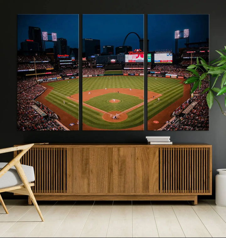 The living room features premium canvas wall art, including a triptych of the St. Louis Cardinals Baseball Team Print showcasing Busch Stadium at night.