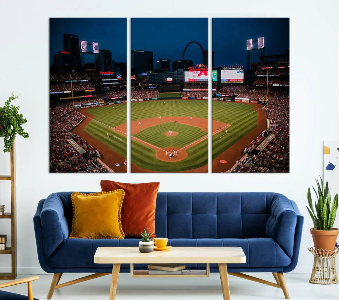 The living room features premium canvas wall art, including a triptych of the St. Louis Cardinals Baseball Team Print showcasing Busch Stadium at night.