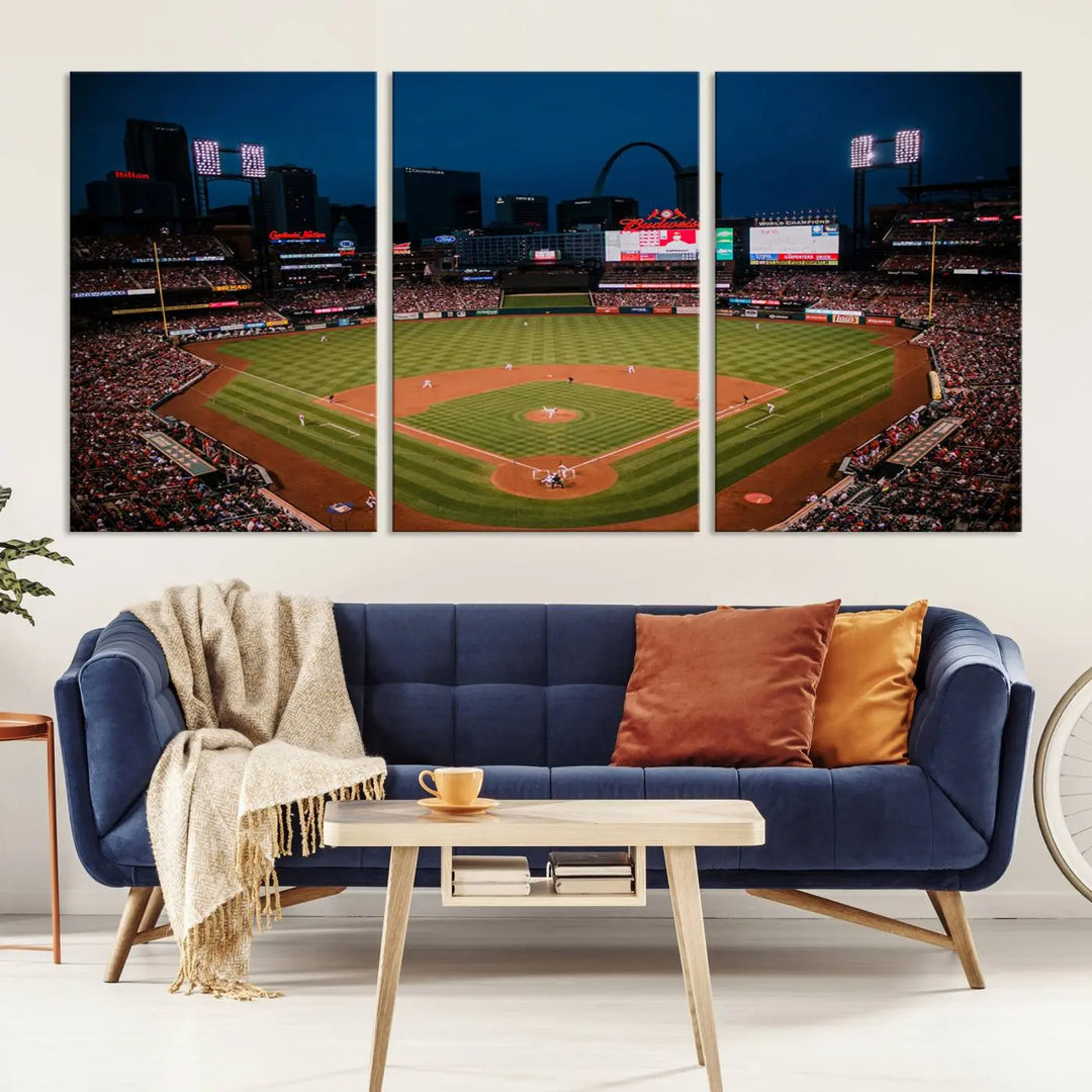 The living room features premium canvas wall art, including a triptych of the St. Louis Cardinals Baseball Team Print showcasing Busch Stadium at night.