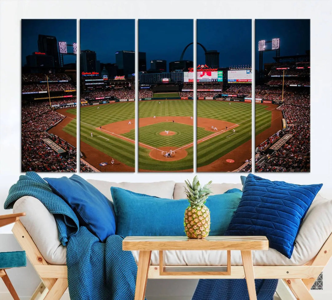 The living room features premium canvas wall art, including a triptych of the St. Louis Cardinals Baseball Team Print showcasing Busch Stadium at night.