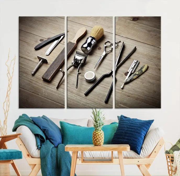 The Standart Barber Tools Wall Art Canvas Print features scissors, clippers, and brushes elegantly arranged on a wooden surface. This piece beautifully captures the essence of barber culture, adding a unique touch to any room.