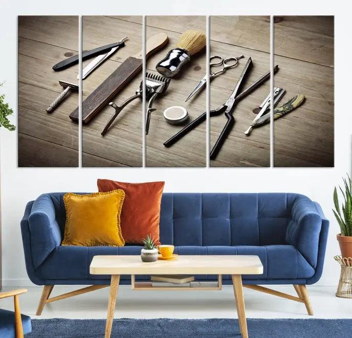 The Standart Barber Tools Wall Art Canvas Print features scissors, clippers, and brushes elegantly arranged on a wooden surface. This piece beautifully captures the essence of barber culture, adding a unique touch to any room.