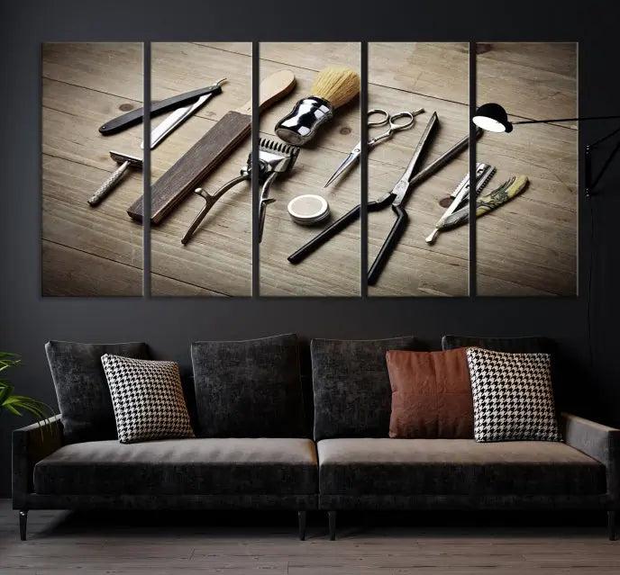 The Standart Barber Tools Wall Art Canvas Print features scissors, clippers, and brushes elegantly arranged on a wooden surface. This piece beautifully captures the essence of barber culture, adding a unique touch to any room.