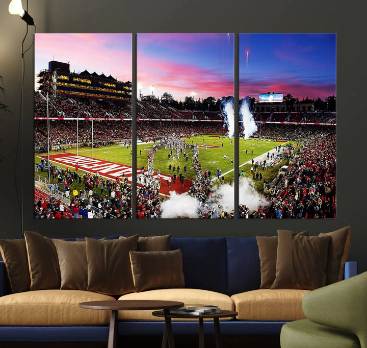 A living room showcases gallery-quality canvas art, featuring a triptych of the Stanford University Cardinal football team with the Stanford Stadium wall art print.