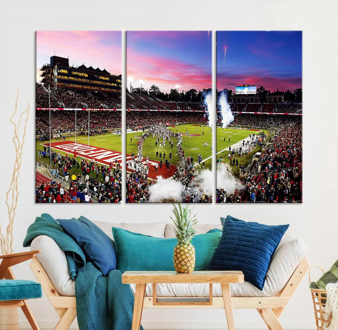 A living room showcases gallery-quality canvas art, featuring a triptych of the Stanford University Cardinal football team with the Stanford Stadium wall art print.