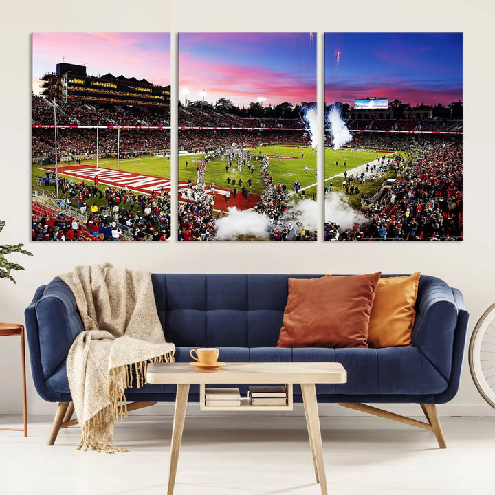 A living room showcases gallery-quality canvas art, featuring a triptych of the Stanford University Cardinal football team with the Stanford Stadium wall art print.