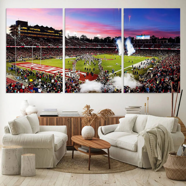 A living room showcases gallery-quality canvas art, featuring a triptych of the Stanford University Cardinal football team with the Stanford Stadium wall art print.