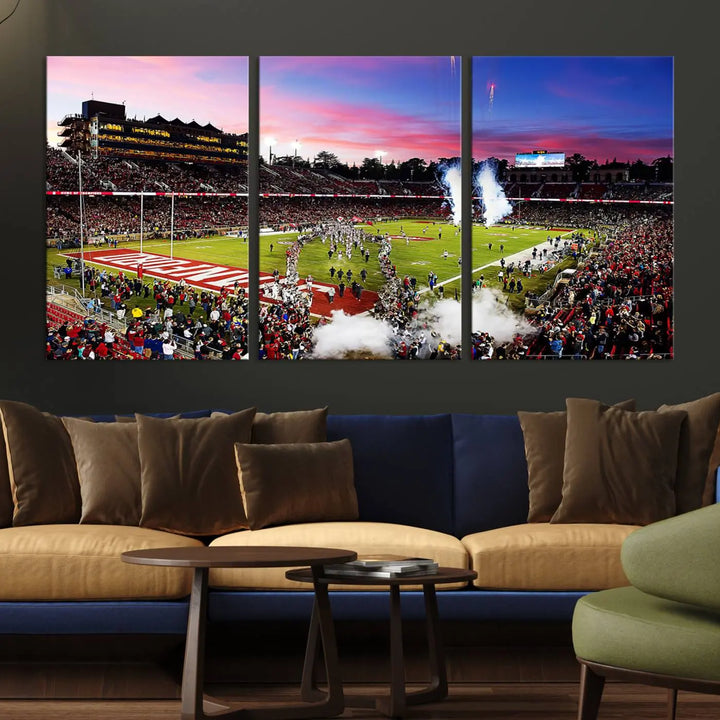 A living room showcases gallery-quality canvas art, featuring a triptych of the Stanford University Cardinal football team with the Stanford Stadium wall art print.