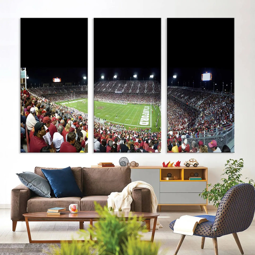 The living room features a large triptych wall art crafted on premium canvas, showcasing the "Stanford University Cardinal Football Team Print - Stanford Stadium," which depicts a crowded football stadium at night. Handmade in the USA.