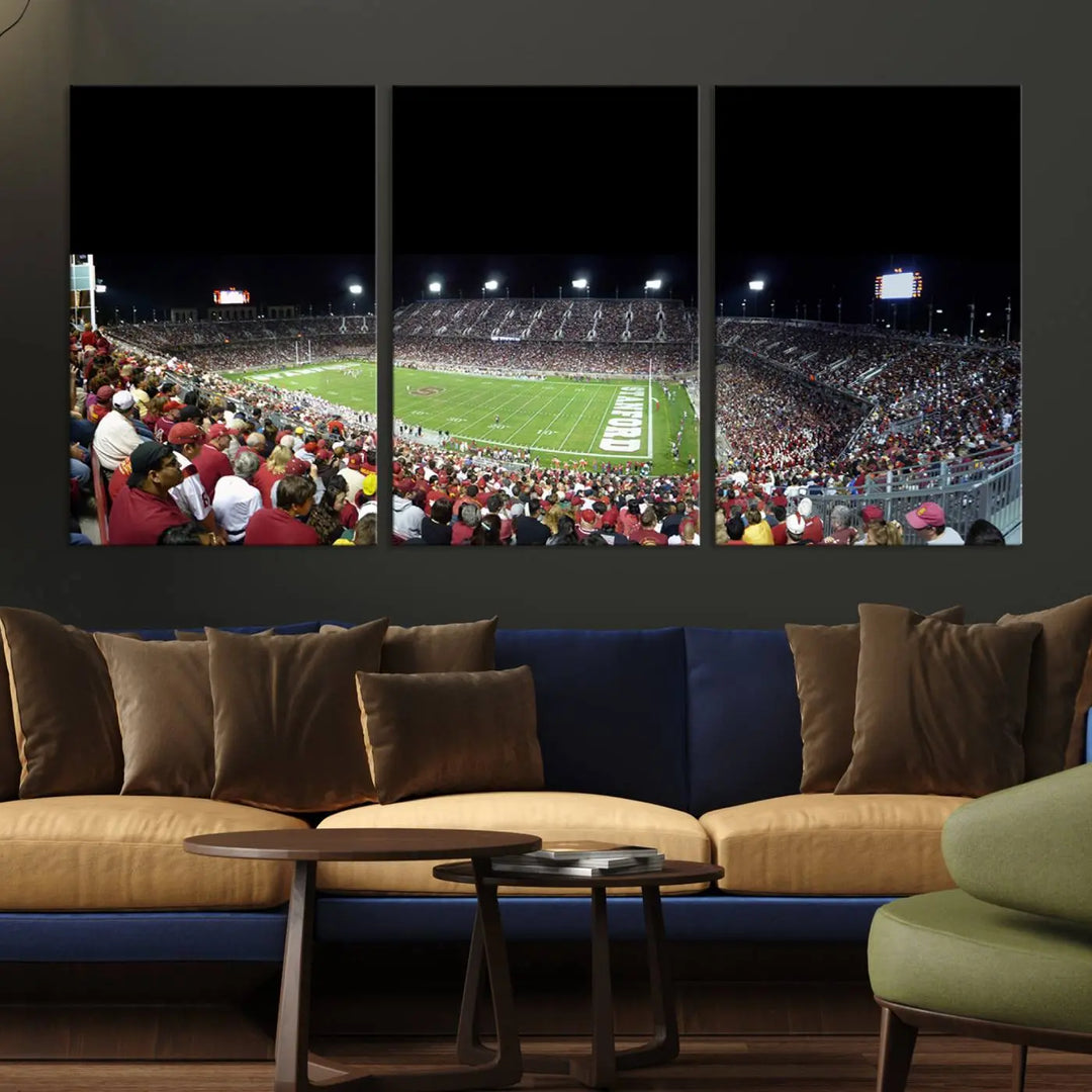 The living room features a large triptych wall art crafted on premium canvas, showcasing the "Stanford University Cardinal Football Team Print - Stanford Stadium," which depicts a crowded football stadium at night. Handmade in the USA.