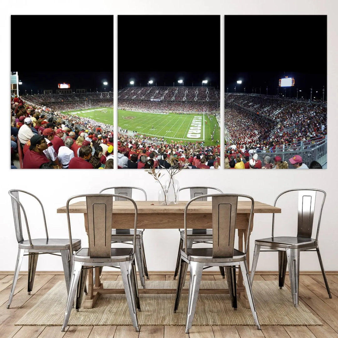 The living room features a large triptych wall art crafted on premium canvas, showcasing the "Stanford University Cardinal Football Team Print - Stanford Stadium," which depicts a crowded football stadium at night. Handmade in the USA.