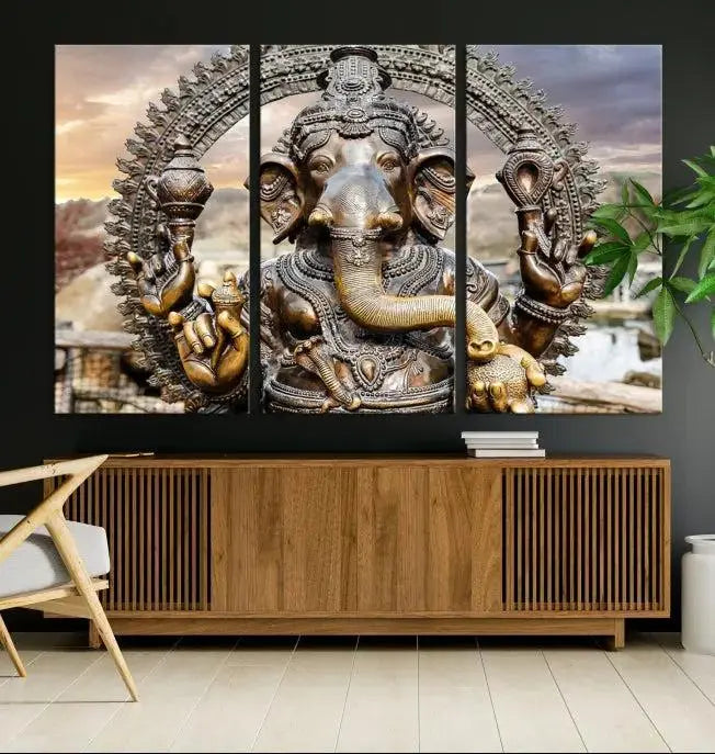 A Statue of Hindu Elephant God Ganesha Wall Art Canvas Print features a museum-quality canvas with a UV-protective coating and is ready to hang against a dark wall.