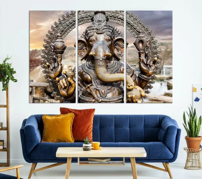 A Statue of Hindu Elephant God Ganesha Wall Art Canvas Print features a museum-quality canvas with a UV-protective coating and is ready to hang against a dark wall.