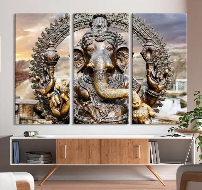 A Statue of Hindu Elephant God Ganesha Wall Art Canvas Print features a museum-quality canvas with a UV-protective coating and is ready to hang against a dark wall.