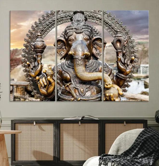 A Statue of Hindu Elephant God Ganesha Wall Art Canvas Print features a museum-quality canvas with a UV-protective coating and is ready to hang against a dark wall.