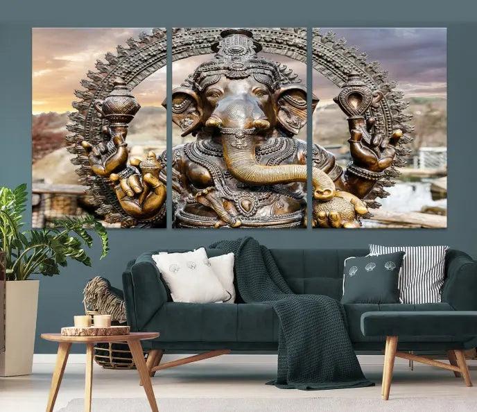 A Statue of Hindu Elephant God Ganesha Wall Art Canvas Print features a museum-quality canvas with a UV-protective coating and is ready to hang against a dark wall.