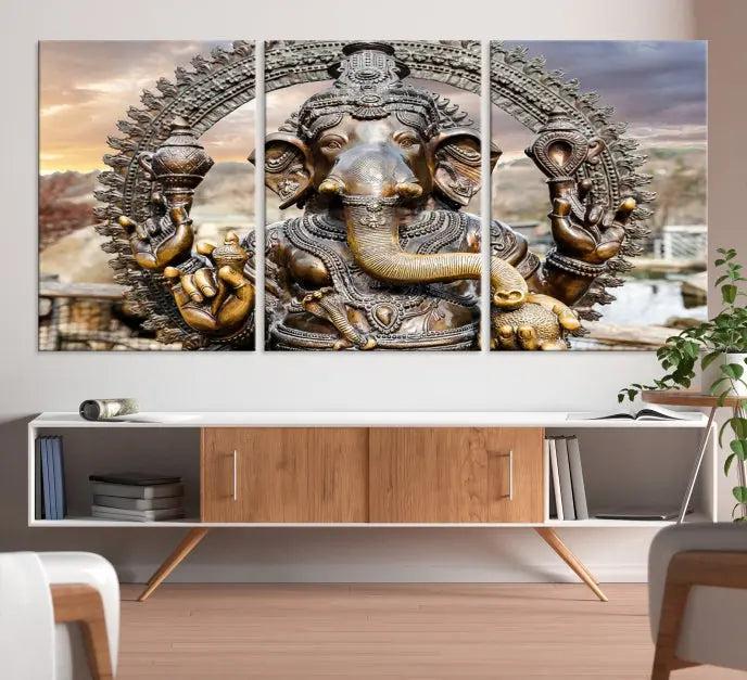 A Statue of Hindu Elephant God Ganesha Wall Art Canvas Print features a museum-quality canvas with a UV-protective coating and is ready to hang against a dark wall.