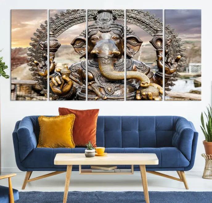 A Statue of Hindu Elephant God Ganesha Wall Art Canvas Print features a museum-quality canvas with a UV-protective coating and is ready to hang against a dark wall.